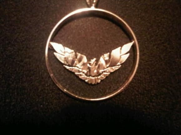 Firebird symbol made from a Silver Eagle dollar coin