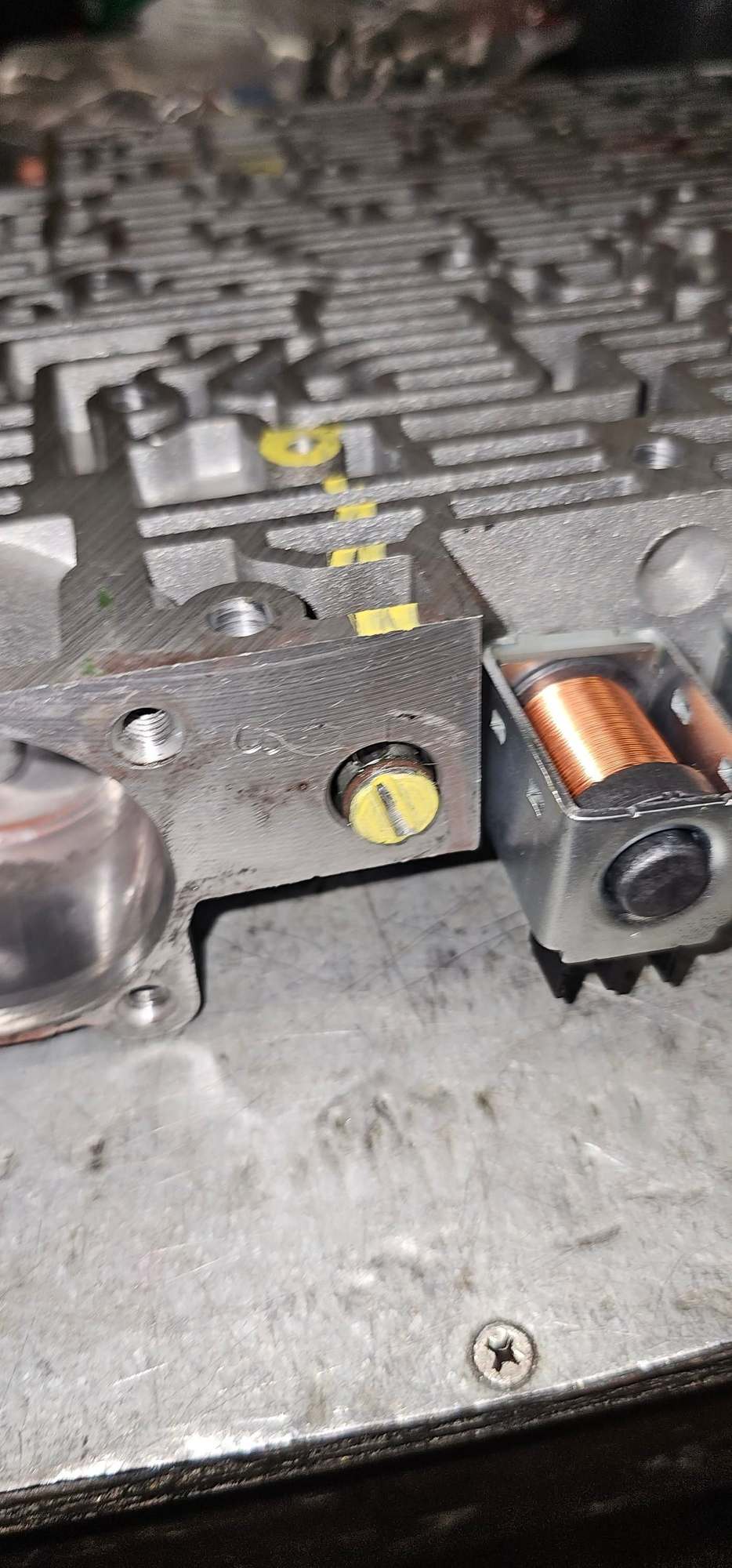 grease and install new plug oring to outside with flat head screw driver narrow enough to slide all the way to spring in bore. Us gentle twistng motion with gengle force till in place then roll then reinstall fwd accum spring, abusevalve aand sprng , install cover.