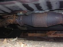 Main rear cat is 'exhausted'... no pun intended. Measurement of rear cat is 13 inches incl flanges. Severe rotten egg smell, but no codes. The fuel gauge sending unit is sticking so it's all over the place. It goes to 3/4 tank full, then 1/3 full, so I never know how much fuel is in her.