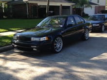 1993 Nissan Maxima with 19" wheels.