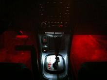 Floor and center console lights, in real life they are a very deep red, not orangey, also my next project is to make the white center one not quite as bright.