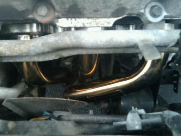 Good Picture of what the headers look on the motor. Looks pretty sick.. not a mod many max owners take on being they are a bitch to intall