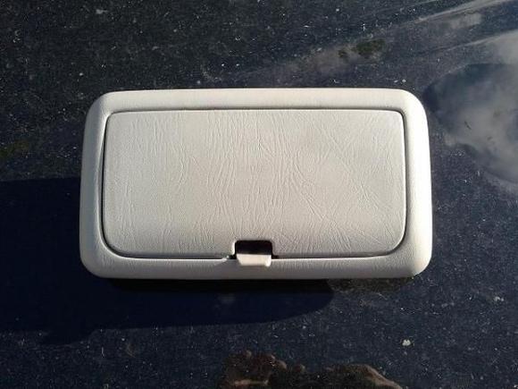 5th Gen sunglasses holder. You can see the latch that holds it in the closed position. The latch recently broke, requiring me to buy a replacement.