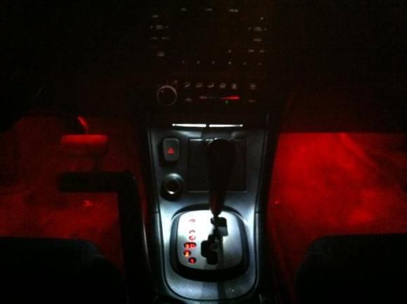 Floor and center console lights, in real life they are a very deep red, not orangey, also my next project is to make the white center one not quite as bright.