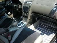 Custom 2 tone leather and suede seats 
Suede door inserts 
Suede arm rest 
Evolution Autodesign diamond-plate floor mats 
Evolution Autodesign brushed aluminum dash kit