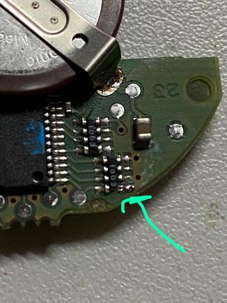 I think it's a filter or a resistor, has the marking 1003 on it. 