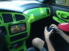 My 2nd oldest son playing the Playstation 3 while I'm driving.