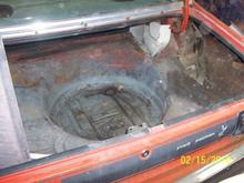 Quarter panel in trunk full of rust.