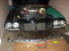 DSCN1826
 Reinstalling front grille.