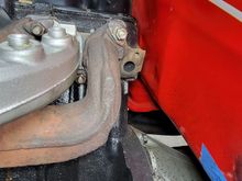 On the rear of my cylinder head, you can see a port whole. Can somebody please tell me what goes there or even better, pm a picture. it has exhaust coming out of it. Thanks