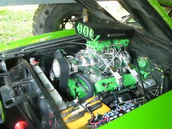 left engine, I was tuning, note the pcv valve is out, I was checking blow by. Every couple of months I put a post-it note over the pcv hole in the crank case and rev it up. Good way to check for ring seal.