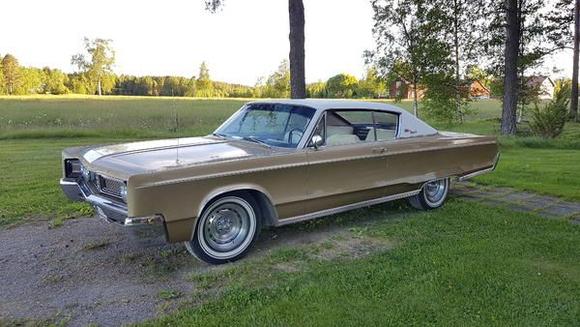 My 1967 Chrysler Newport 2d HT shining in the evening sun in Sweden.