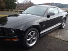 06 with pony package. 83k ,  auto, leather .  I took cleaner wax to it, then carnuba, and it shines like new!