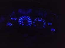 Upgraded gauge cluster bulbs with T5 blue LEDs. I also upgraded HVAC and shift assembly with T10 blue LEDs