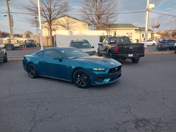 2026 Ford Mustang GT --- 6spd manual & painted Adriatic Blue.