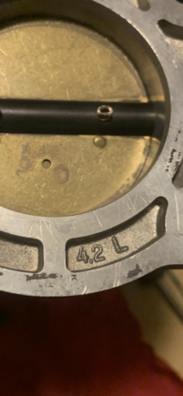 The throttle body.