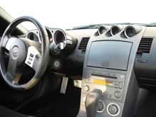 Here is a picture of the dash and the steering wheel. Very clean inside!