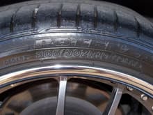 rear tire fitment is 305/30-19 Bridgestone RE050A