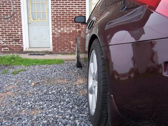Stock suspension, stock 18" wheels, stock tire sizes, 30mm rear spacers.