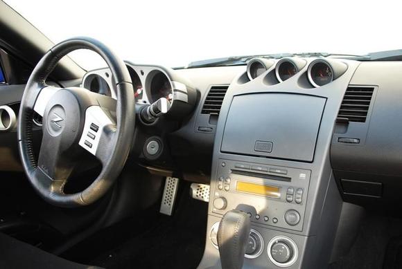 Here is a picture of the dash and the steering wheel. Very clean inside!