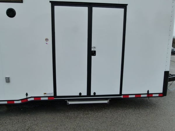 2022 CARGO MATE ELIMINATOR R/T WHITE WITH BLACKOUT TRIM 