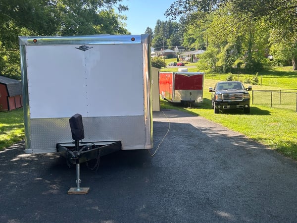 TWO STORM TRAILERS & A DURAMAX FOR SALE