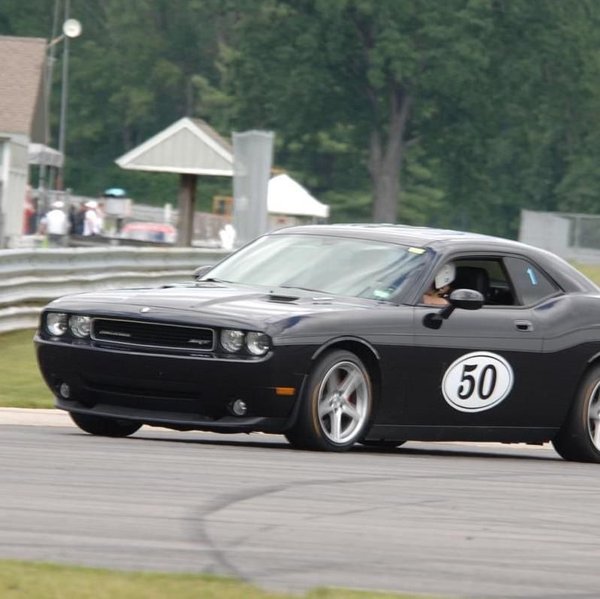 Four Continental Slicks on Shelby Replicas for Modern Mopar 