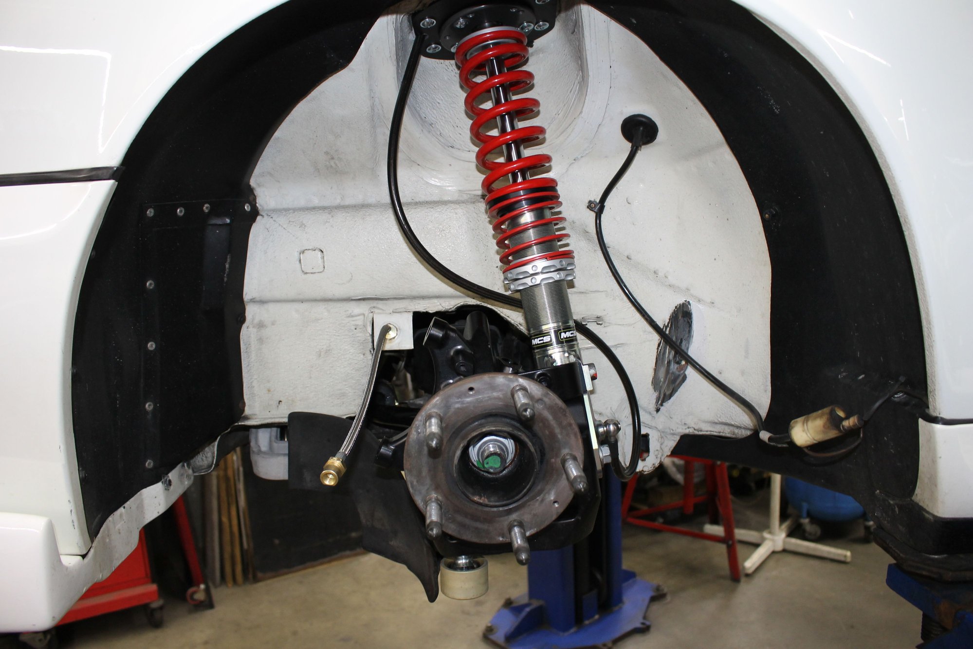 Where to mount rear canisters for remote reservoir shocks Rennlist