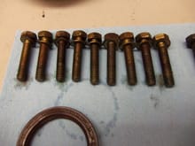 Front pump mounting bolts. Are these supposed to have some kind of sealant or locking compound on them?