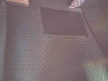 Leather floor mats with carbon fiber heel pad in 928