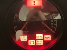 Comes on when ignition key is turned on to position 2, goes off when engine starts position 3.