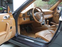 Leather everywhere- speaker grills, vents, pillars...