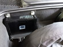 And the amplifier in the trunk. I had to build a little frame using the old CD-player frame and some metal stock. I later put black electrical tape over the shiny metal so that it blends in better.