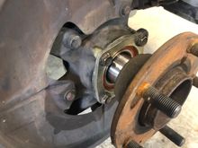 Pulling the hub into the bearing. 