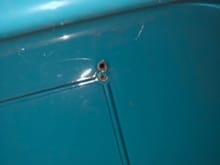 Extra hole drilled by dealer