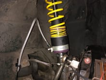 Coilover with hydraulic cylinder installed and plumbed

