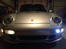 Yellowish old fog lights on screen left. New turbo scoops with LED's on screen right.