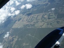 This guy drew his name on his property with trees.  It's between Austin and Houston, Texas.