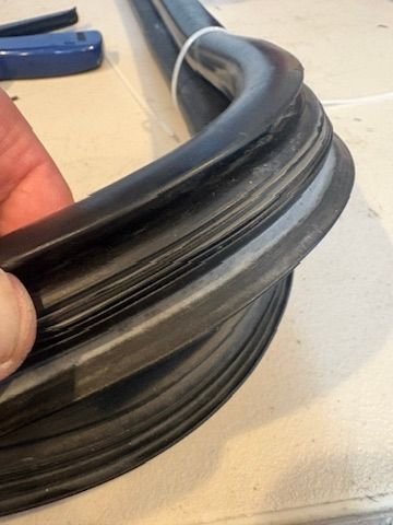 This is the aftermarket seal bottom vs the factory seal top as you can see the lip is considerably larger on the factory seal. It was equally as short as the factory seal. 