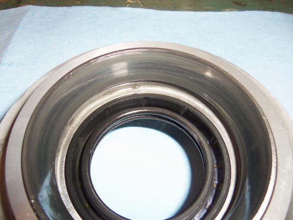 Right side bearing cap with differential bearing outer race.