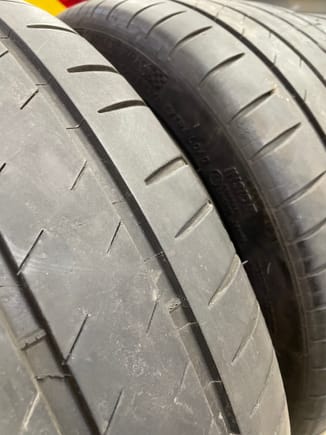 Inner edge of rear tire #1