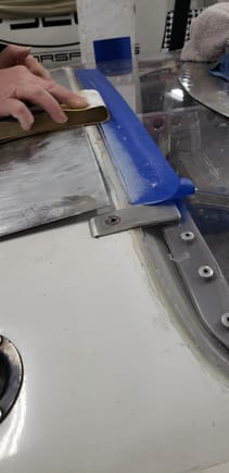 Careful sanding of the leading edge of the plexi to lower the leading edge.
