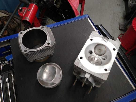 Fresh from the machine shop are the pistons, cylinders, and heads.