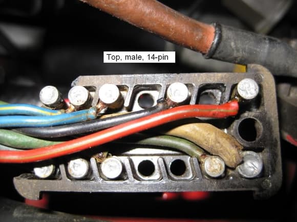 This is the upper half of the 14 pin connector with the top cover removed.
 Note the fat yellow wire, #14
 this is the furthest forward and the closest to the right fender