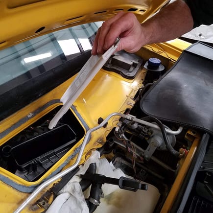 Reinserting the flap ... it is critical to ensure you put it back in the exact orientation that it was originally in ... it is easy to put it in backwards and if you do that, it will not function correctly