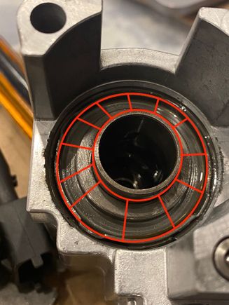 The plate that need to be compressed down with a press and the center tube you need to stay clear of. 