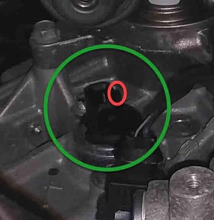Note how the electrical connection is offset to the lower left.  The red circle is the key for the electrical connector.