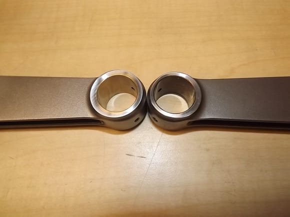 "New design" connecting rod on the left.
