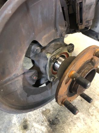 Pulling the hub into the bearing. 