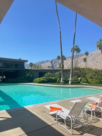 The first thing you see are the "Twin Palms" which haven't grown much since 1947 and the piano shaped swimming pool. I like that hey have classic designed chairs like we had in the 60's with the plastic slats. I haven't seen these in decades.